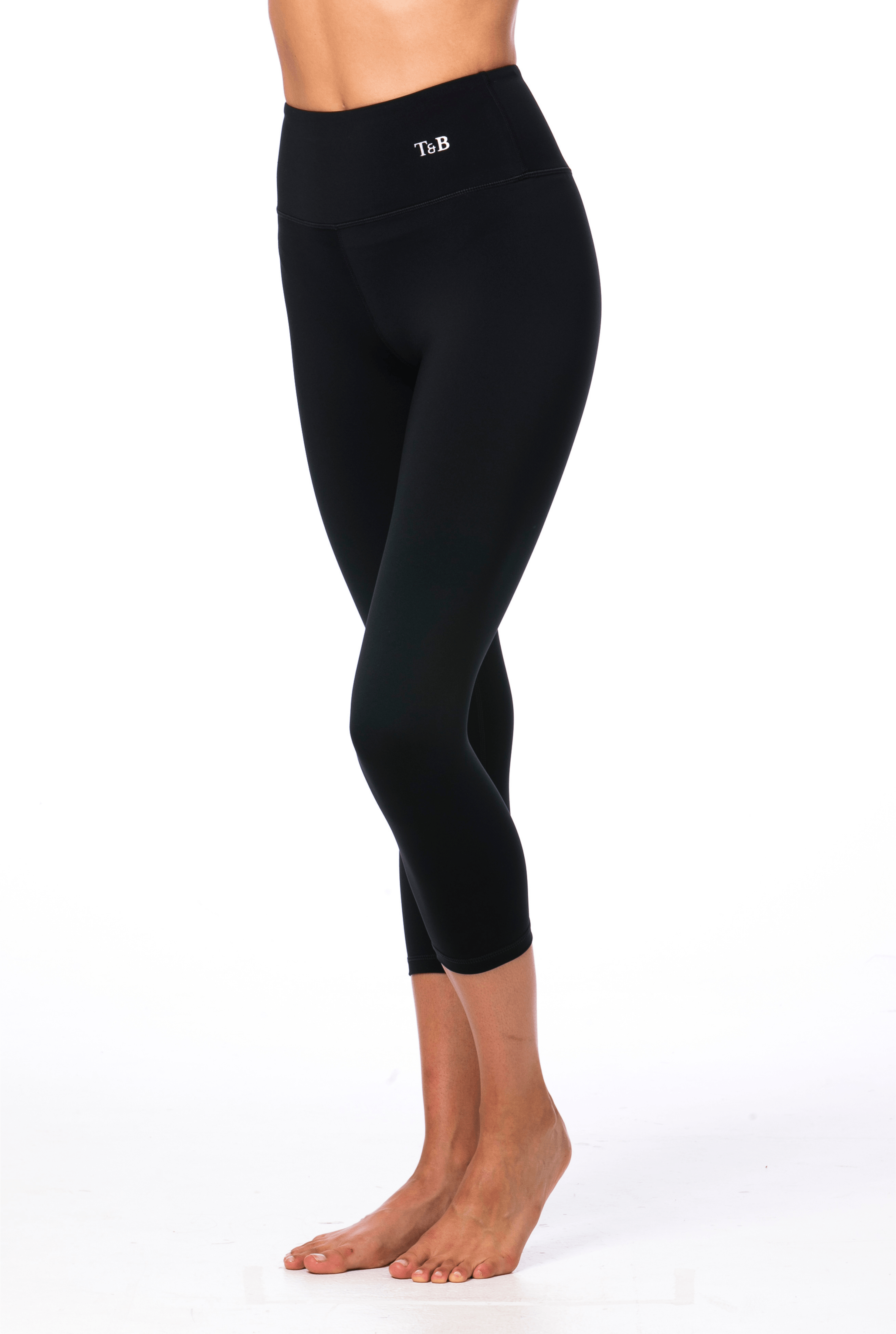 Trendy and Bendy high waisted 7/8 black legging made with recycled material will flatter and accentuate your legs. You will love the "scuba" feel of the fabric, which provides you with that extra support and comfort. The Kim leggings are ideal for are ideal for yoga or Pilates or just for a stylish everyday look.