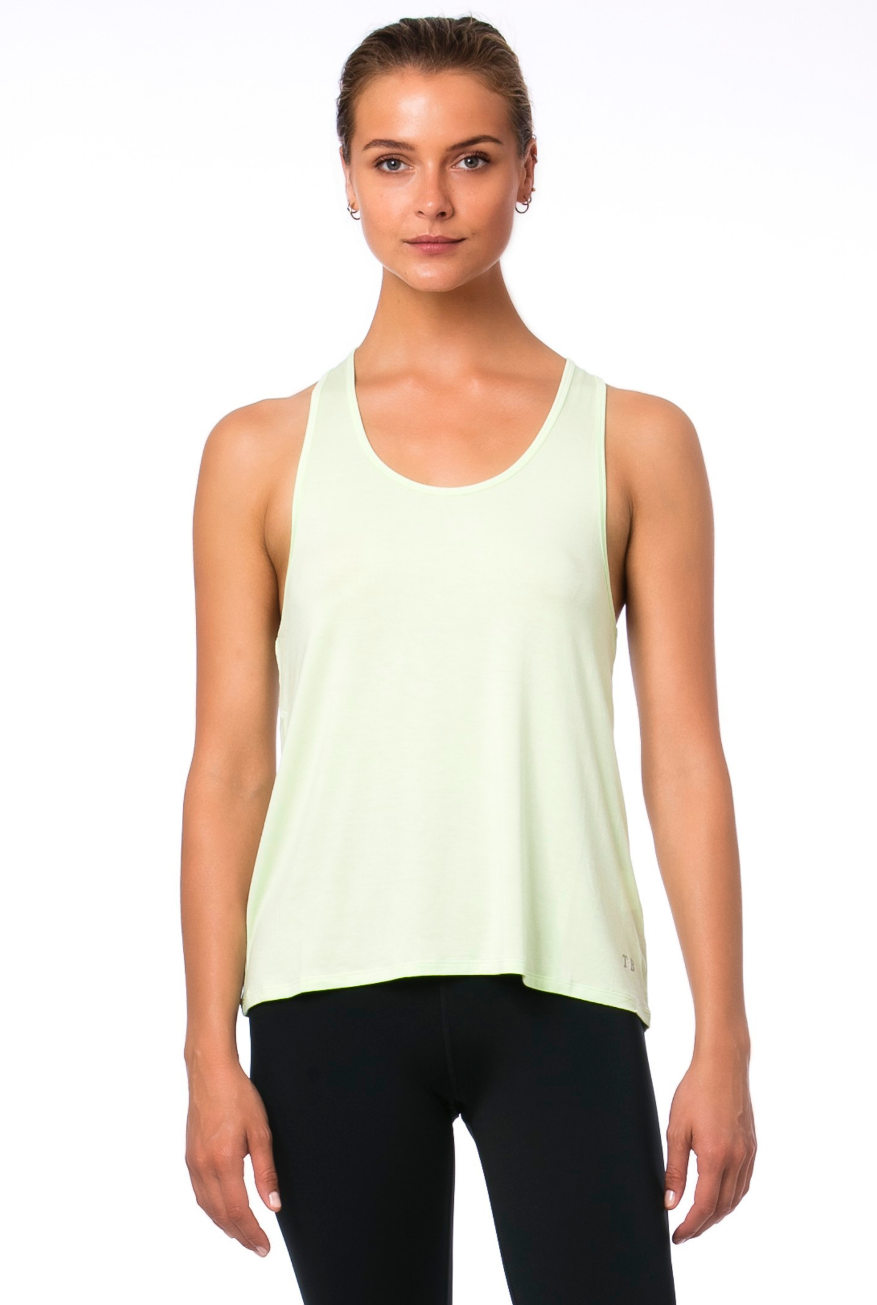 Trendy & Bendy Ashtanga Tank in lime green has a flattering round neckline and is designed to compliment your waistline. It is a long length tank with a racer back, made with modal fabric and is a super soft, buttery fabric. It is lightweight, breathable, stylish and versatile.